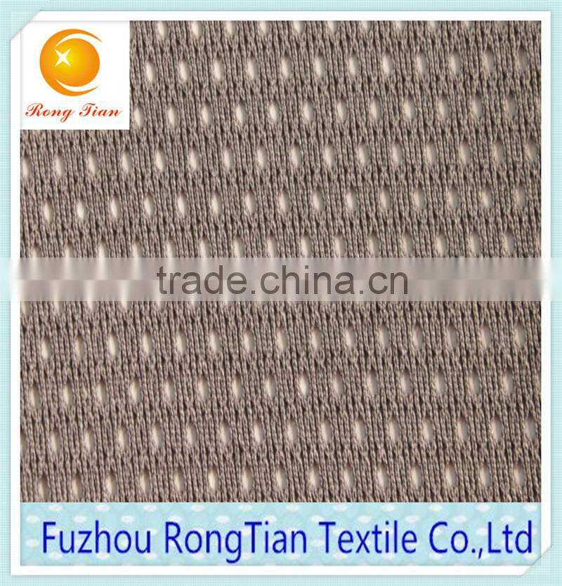 Factory sales grey polyester warp knitted low elastic hole lining mesh fabric