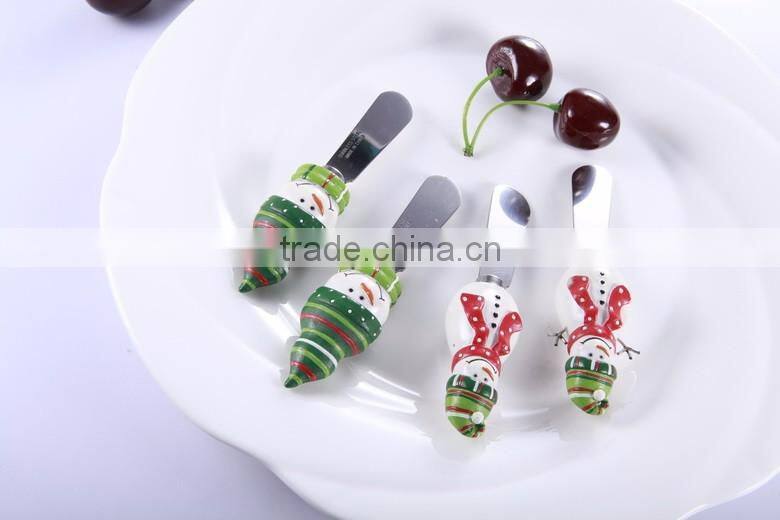 Top quality Snow man design Christmas products butter knife with polyresin head