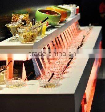 2016 new design acrylic solid surface built hotel buffet table