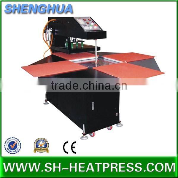 Four stations heat transfer press for sublimating logo label on garment