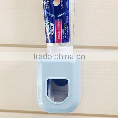 Hot sale ABS Self-Adhesive Sticky Automatic Toothpaste Dispenser Wall Mount Stand