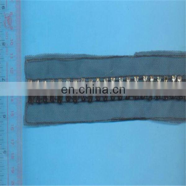 black metal sticks and clear rhinestones beaded trim tape on mesh