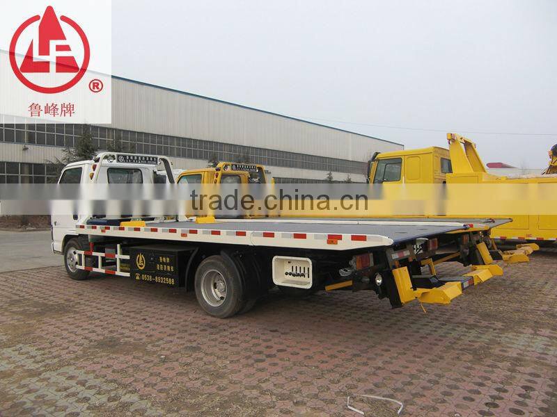 Light Duty ISUZU 5 Ton slide flatbed road wrecker tow truck for sale which could transport 20ft container,equipment and machines