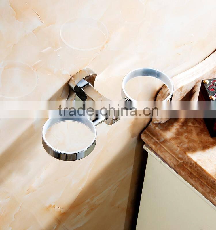 bathroom accessory with brass double cup holder for hotel family use.