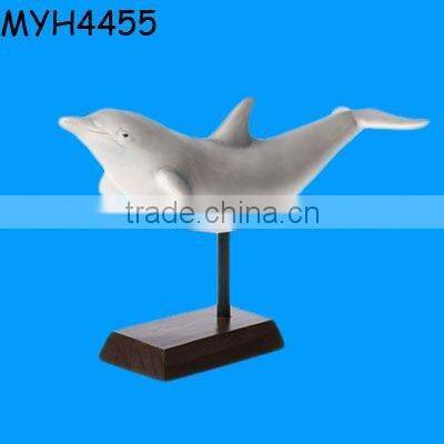 Ceramic spotted dolphin statue