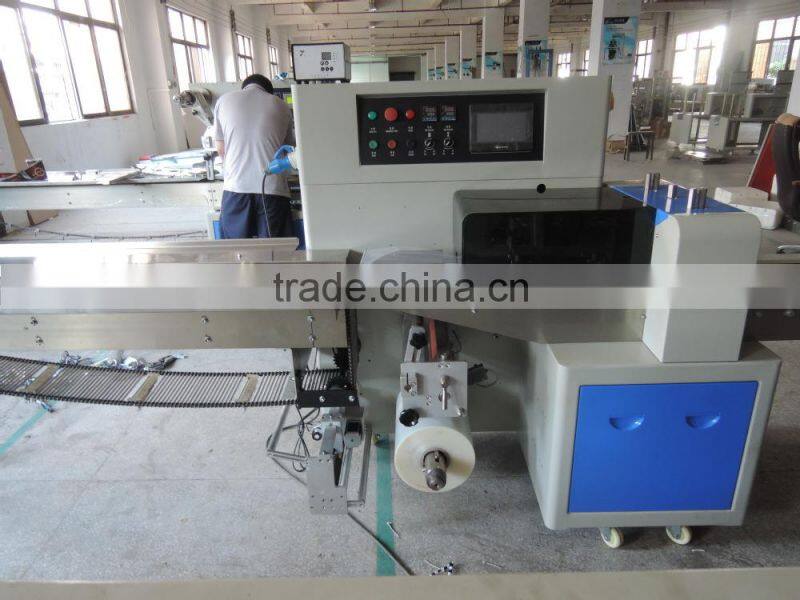 Automatic price snack cookies packing machine in India(DCTWB-350X)