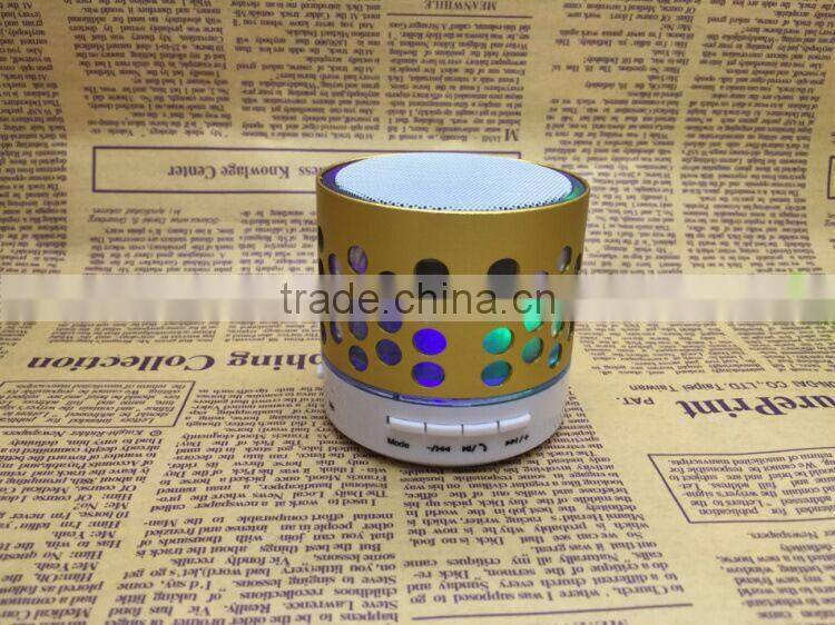 Round hole wireless Small mobile phone bluetooth speakers subwoofer TF card speaker hands-free speaker with LED FM