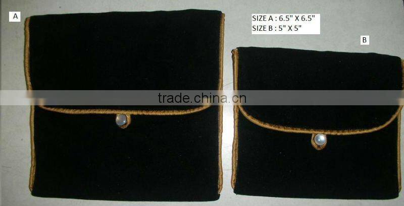 Velvet flap pouch with button closure
