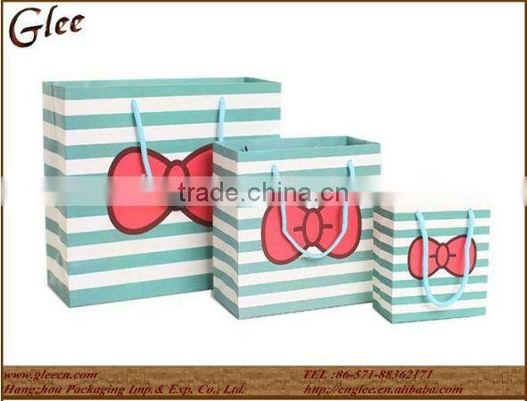 Cheap cartoon paper shopping/gift bag with handles