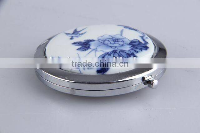 The ceramic surface round flip mirror