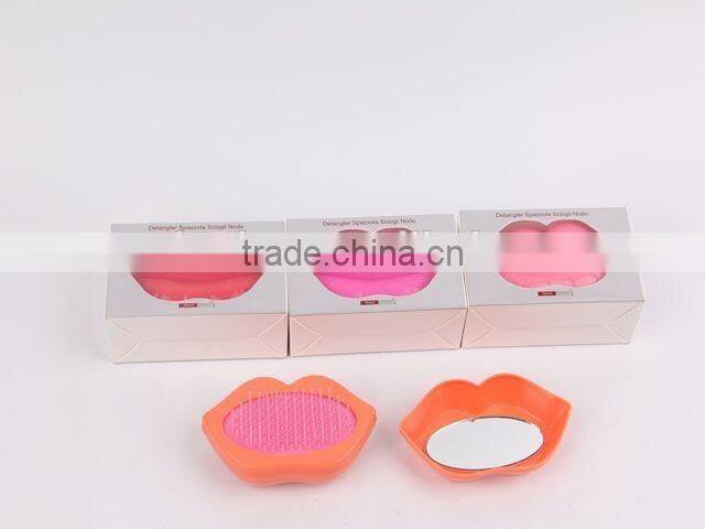 Lip shaped plastic massage comb with mirror/hair brush
