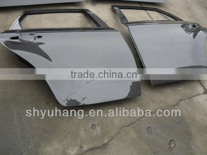 carbon fiber door before and after for GRB STI