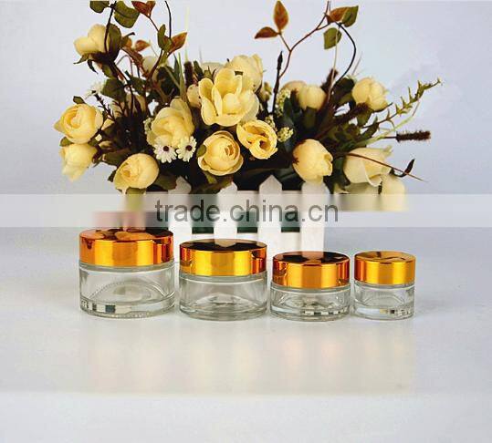 30g empty cylinder transparent facial cream cosmetic glass jar/salve oil cream jar with shiny gold/sliver aluminum screw lid