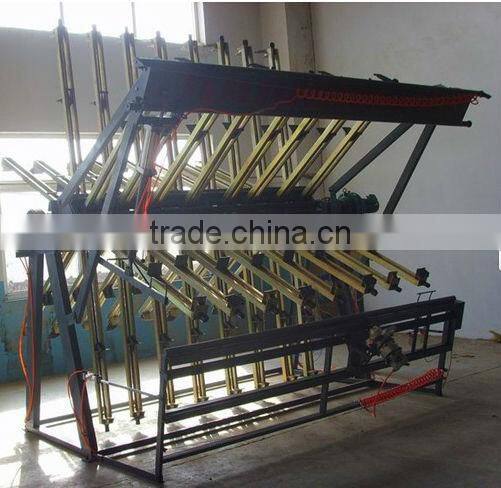 Pneumatic wood composer rotary clamp carrier for wood