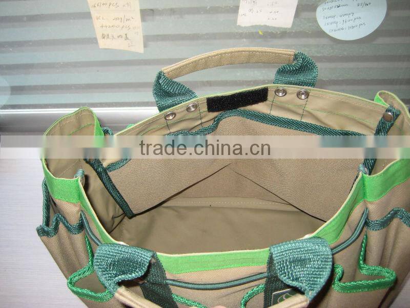 Green and lightgray tool bag with tow handles