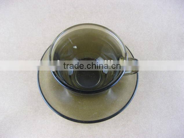 Glass cup and saucer/glassware