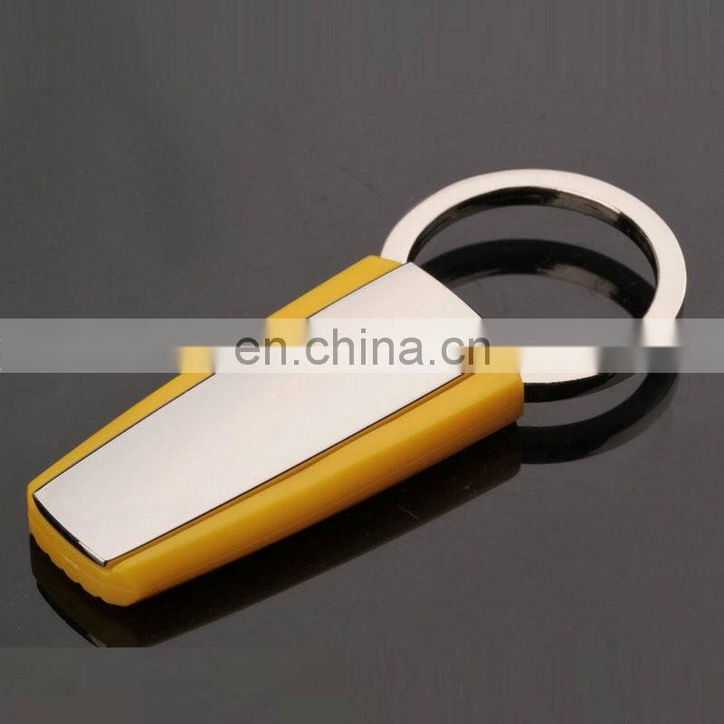 Wholesale Simple Cheap yellow Color metal rubber Keychain with laser logo