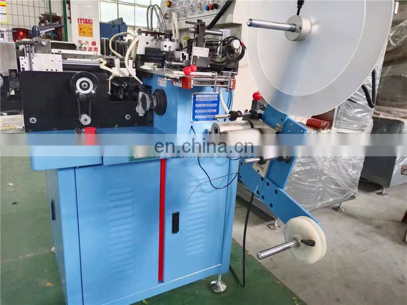 US4000 Auto hot cold knife cotton webbing ribbon garment nylon label cutting and folding machine with triangle middle fold