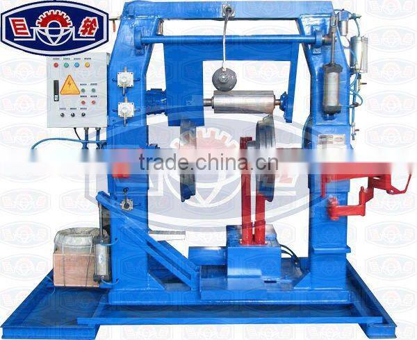Tire retreading building machine