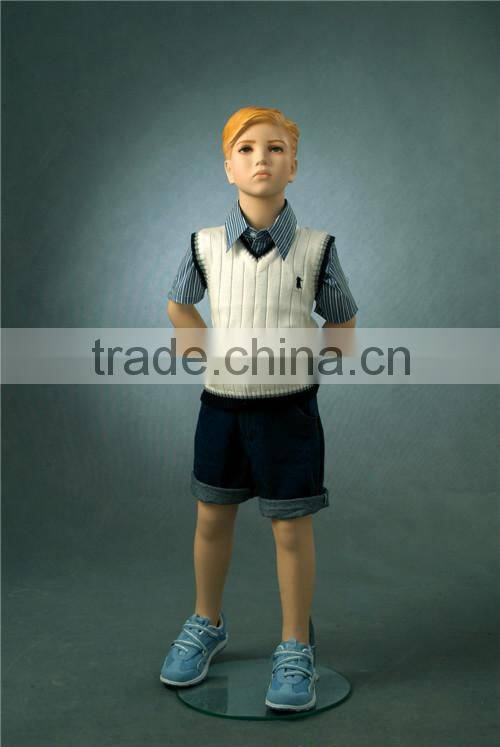 Christmas window display dress up realistic children mannequins
