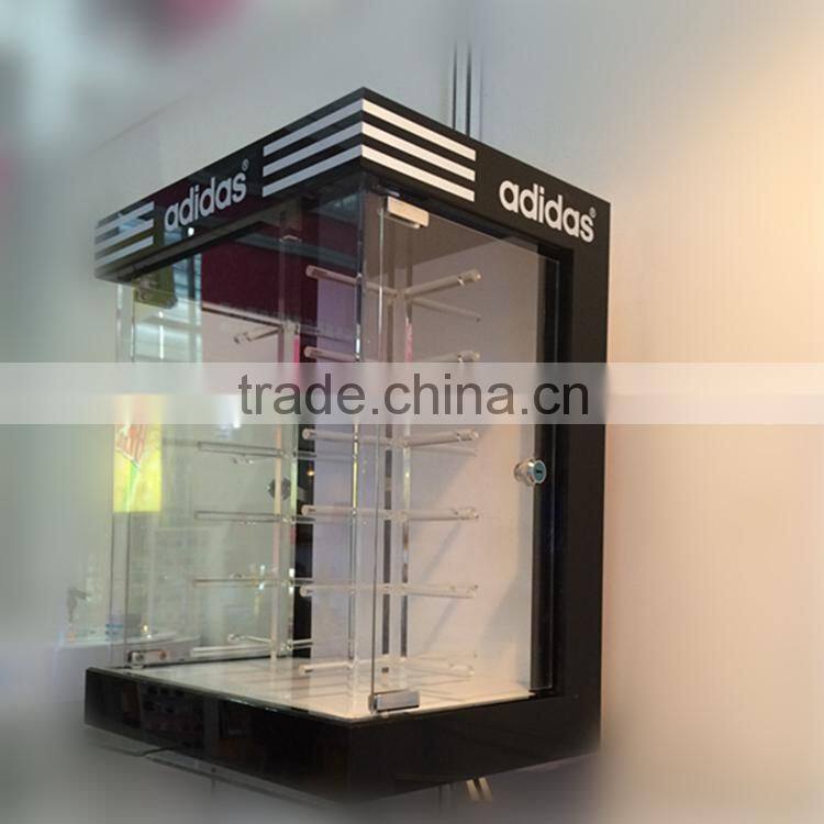 Locking sunglass display, sunglasses display with lock, fashionable sunglasses shelf display