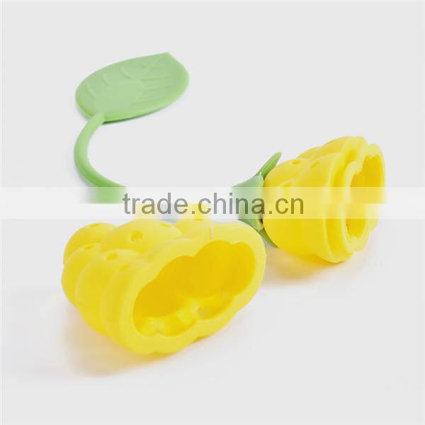 Small stainless steel teapot shaped strainer