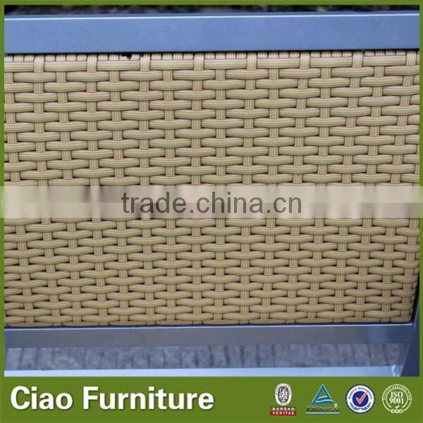 Aluminum rattan garden chair with teak wood arm