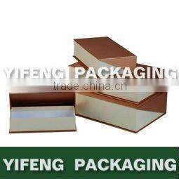 white nested cardboard boxes with ribbon design