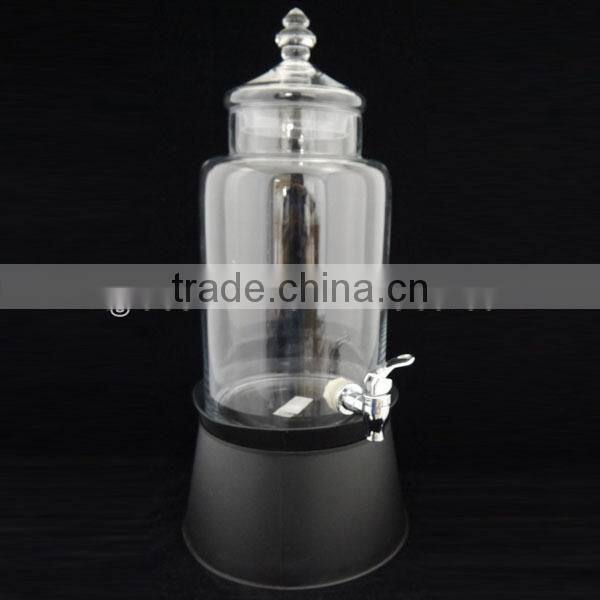 country style clear round juice dispenser with white metal ice bucket