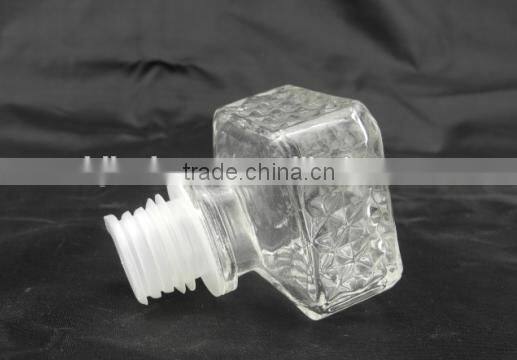 square glass wisky russian liqueur bottle with lid