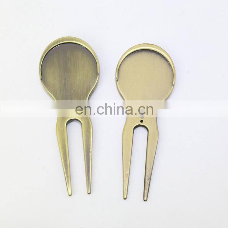 metal golf divot repair tool with golf ball marker