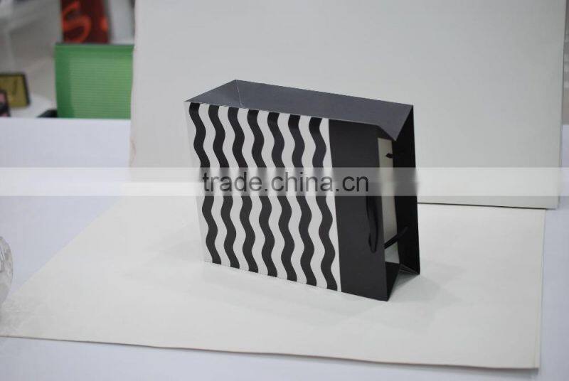 popular good looking new fancy black and white stripe paper gift bag with ribbon handle supplier and manufacture