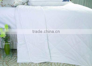 plain white quilt