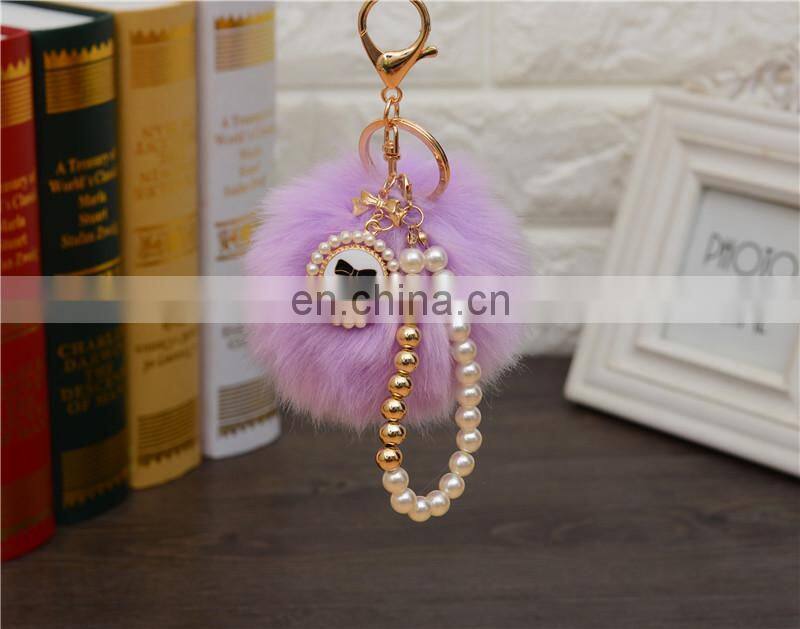 2021 Wholesale custom luxury fur ball key holder Pearl keychains pom pom bow keychain for women bag good quality