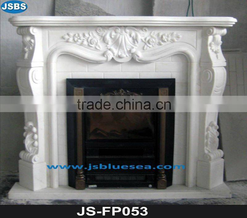 Stone carving of yellow marble fireplace mantel