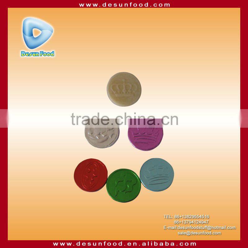 Gold coin bubble gum in water bottle