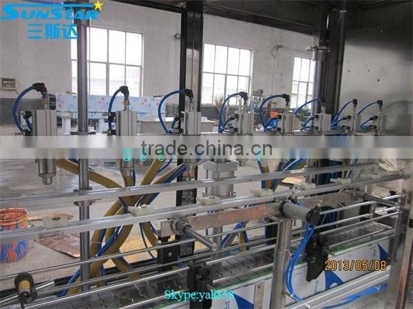 Automatic linear type grease filling machine for olive cooking sunflower oil in bottle barrel or jar can