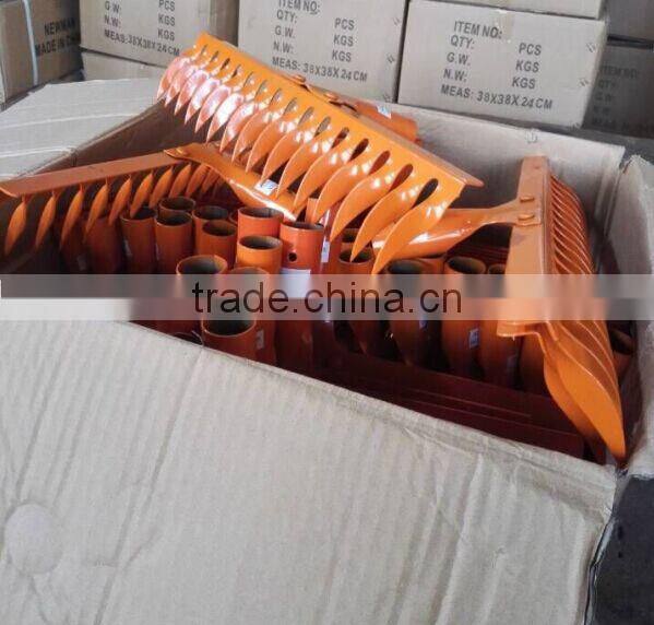red color riveted grass lawn rake