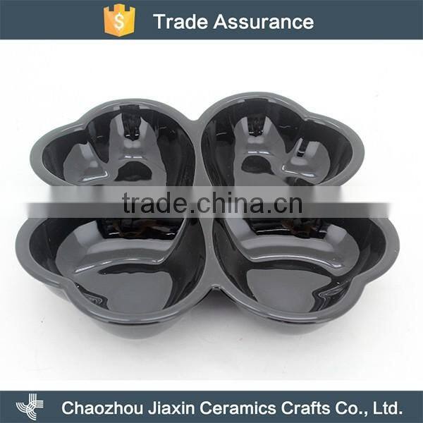 Cheap durable clover shaped black ceramic snack dish