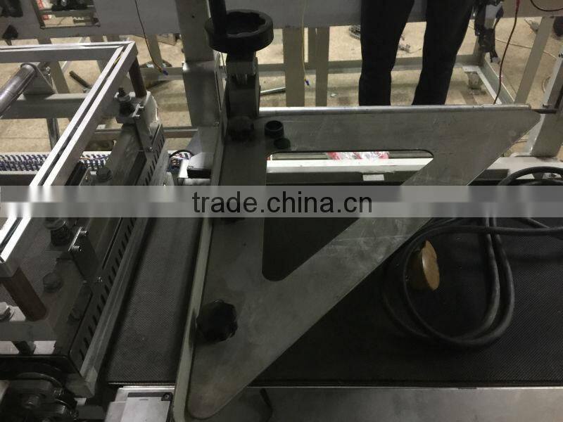 High speed auto L-bar sealer and shrink tunnel