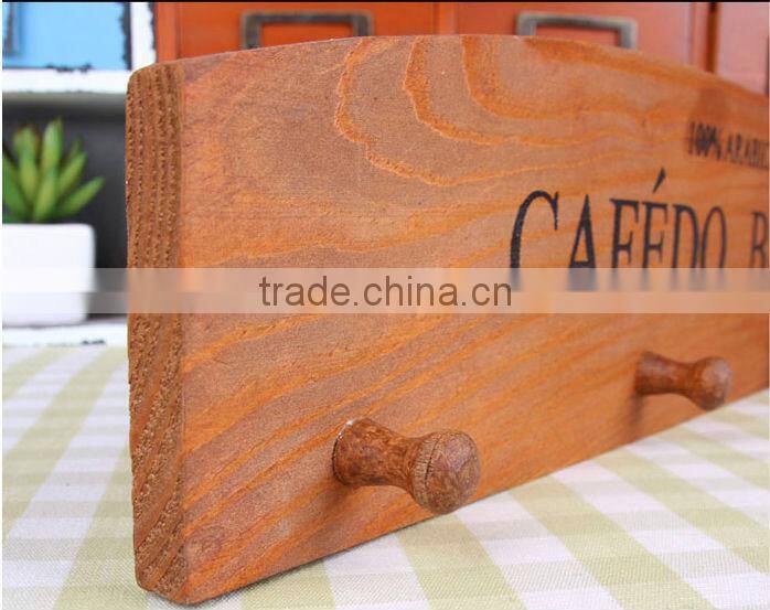 brown zakka wooden wall hanging