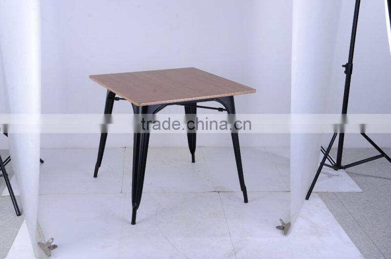 xavier pauchard dining table with wooden top for dining room