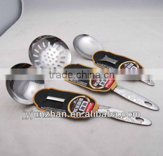 Stainless slotted turner with SS handle with rose on and low price