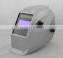 Auto-darkening welding helmet