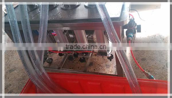 Four Heads Fully Automatic Toiletry Perfume Bottle Filling Machine