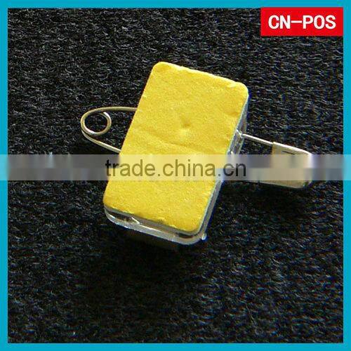 holding plastic badge clip with foam tape to connect