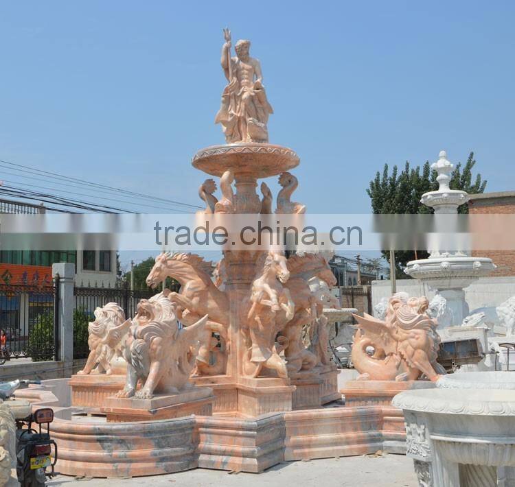 Large pink marble water fountain with poseidon and horses