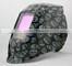 Auto-darkening welding helmet