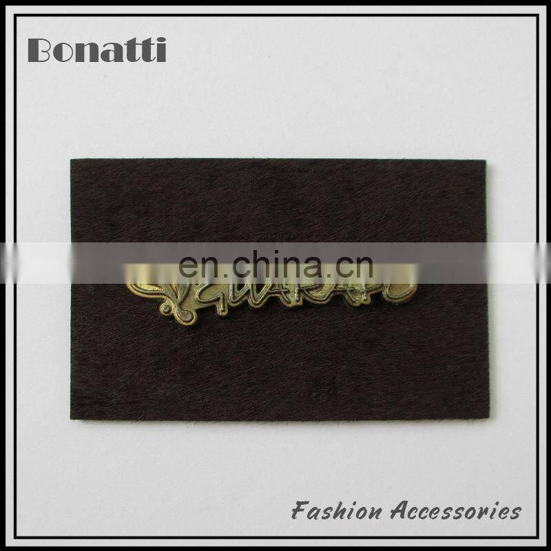 2013 hot clothing metal label with leather base