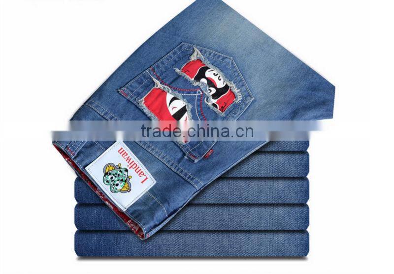 2015 Ripped Slim100% Cotton Jeans top fashion men designer jeans stock men stone washing hole blue jean trouser with opera face